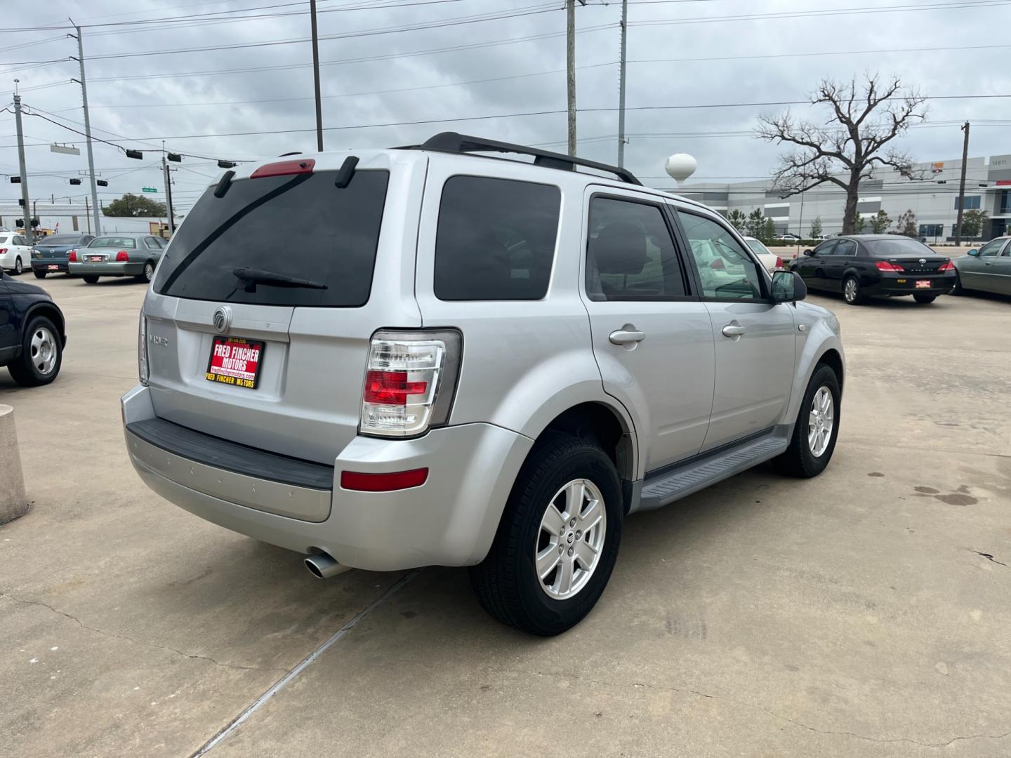 2009 SILVER /gray Mercury Mariner V6 2WD (4M2CU81G49K) with an 3.0L V6 engine, 6-Speed Automatic transmission, located at 14700 Tomball Parkway 249, Houston, TX, 77086, (281) 444-2200, 29.928619, -95.504074 - Photo#6